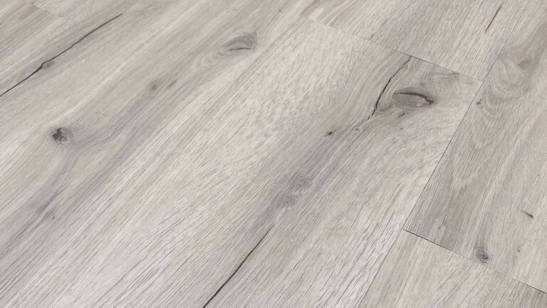 Grauer Holzfußboden mit Maserung.